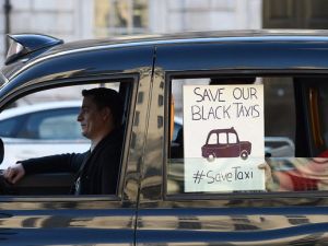 An Uber driver protests in London.