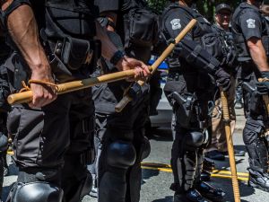 THE COMMON, BOSTON, MASSACHUSETTS, UNITED STATES - 2017/08/19: The Far Right were far out numbered on August 19, 2017, when a small contingent of the Alt-right attempted to stage a "free speech" rally in Downtown Boston. Over 40,000 counter-demonstrators surrounded the minuscule white nationalist rally. By 1:30 p.m. the Boston Police had announced that the rally had ended. Riot police were then forced to create an evacuation route for the white supremacists to leave. There were at least 33 arrests.