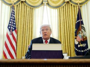 President Donald Trump after signing tax reform legislation into law in the Oval Office on December 22, 2017.