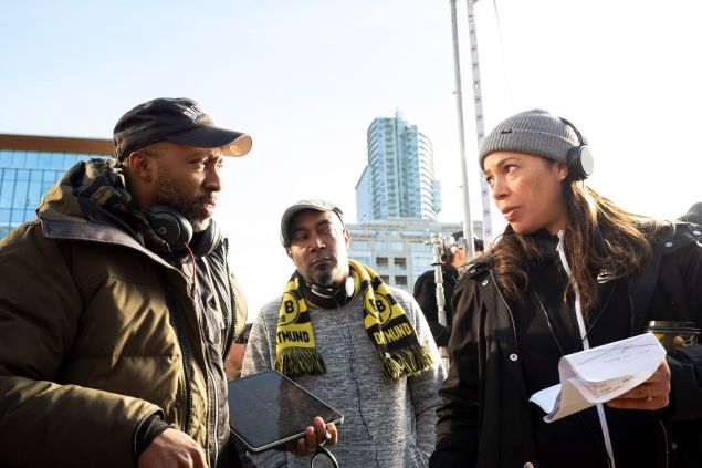 Writer Maurice Marable (left) and writer and cartoonist Keith Knight (center) on the set of Woke