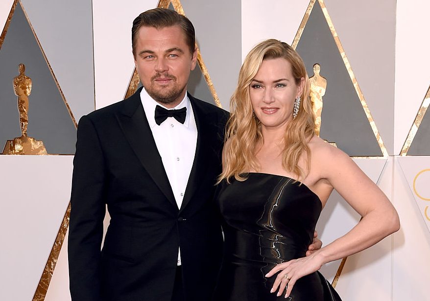A man and woman in formal attire.