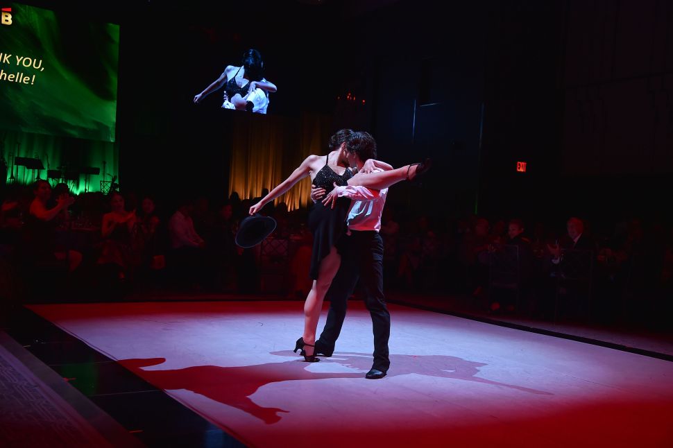 A dramatic pose in a ballet performance.